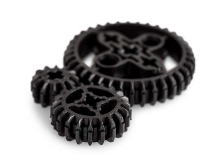 Set of toothed gears of different sizes for transmitting motion and changing direction in a mechanical deviceの写真素材