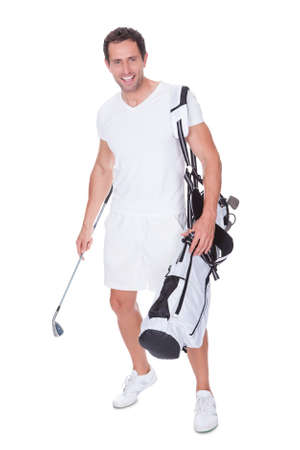 Golf Player Holding Bag With Clubs Isolated On White Backgroundの写真素材