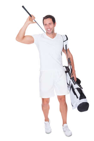 Golf Player Holding Bag With Clubs Isolated On White Backgroundの写真素材