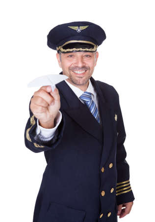 Portrait Of Happy Pilot On White Backgroundの写真素材