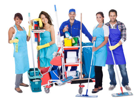 Group of professional cleaners. Isolated on white