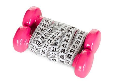 Dumbbells wrapped in measuring tape. Fitness concept. Isolated on whiteの写真素材