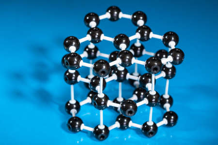 Model of graphite molecular structure on green reflective backgroundの写真素材