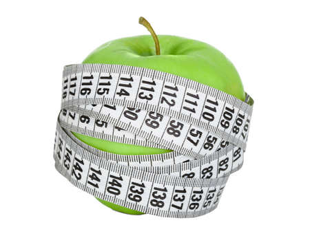 Apple wrapped in measuring tape. Diet concept. Isolated in whiteの写真素材
