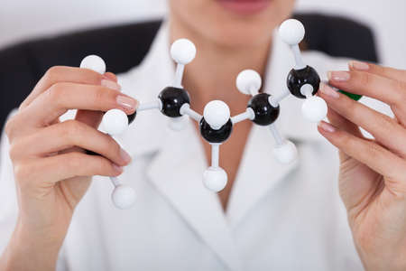 Female Scientist Concentrating On Molecular Structure In Laboratoryの写真素材