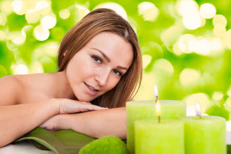 Portrait Of Beautiful Young Woman Relaxing In Spaの写真素材