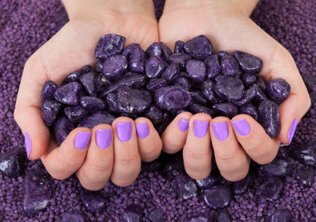 Human Fingers With Beautiful Manicure In Purple Color