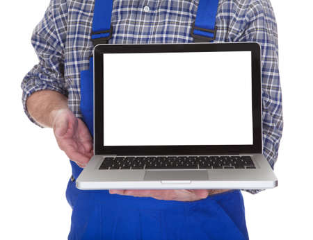 Mature Male Technician Showing Laptop Over White Backgroundの写真素材