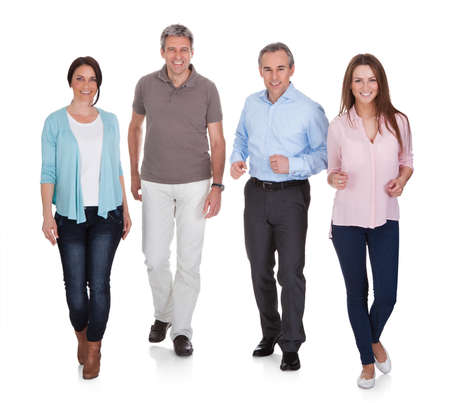 Portrait Of Happy People Walking On White Background Portrait Of Happy People Walking On White Background