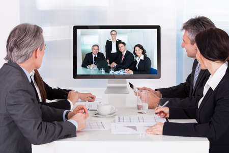 Group Of Businesspeople In Video Conference At Business Meetingの写真素材