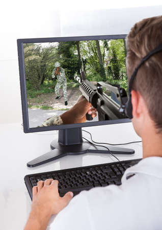 Photo Of Young Man Playing Computer Games