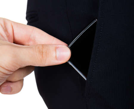 Close-up Of Hand Taking Wallet Out Of The Pocket Over White Background