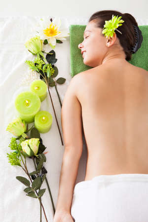 Beautiful Young Woman Relaxing In A Spaの写真素材