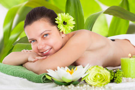 Beautiful Young Woman Relaxing In A Spaの写真素材