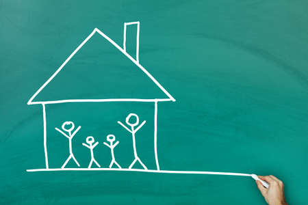 Family at home concept on green blackboardの写真素材