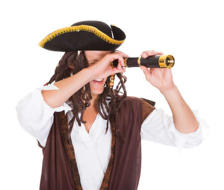 Portrait Of A Pirate Holding Telescope Over White Backgroundの写真素材