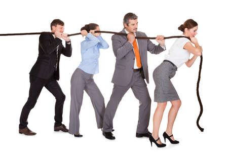 Group Of Businesspeople Pulling Rope Over White Background