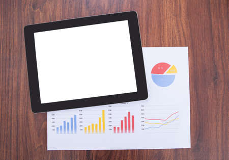 High Angle Of Digital Tablet Document And Coffee On Table