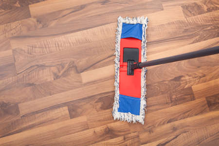 High Angle View Of Mop On Hardwood Floorの写真素材