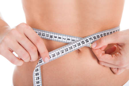 Woman Measuring Perfect Shape Of Beautiful Body