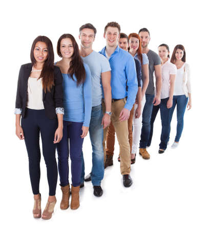 Diverse group of people standing in row. Isolated on white