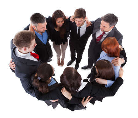 Business people standing in circle. Isolated on whiteの写真素材