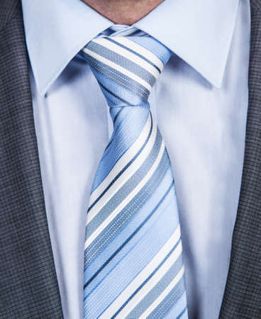 Closeup photo of businessman's blue striped necktieの写真素材