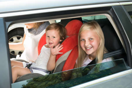 Happy Kids Traveling By Car. Outdoors Shotの写真素材
