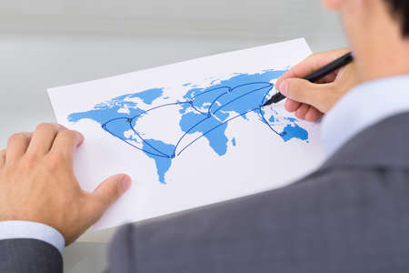 Global business concept. Over the shoulder viewの写真素材