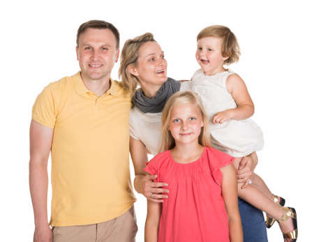 Happy Young Family Together With Kids. Isolated On White