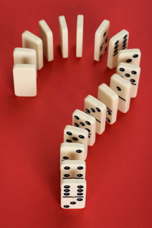 Question Mark Made From Domino On Red Backgroundの写真素材