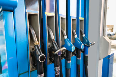 Close-up Of Fuel Pump Nozzles At The Gas Station