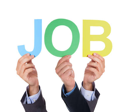 Close-up Of Businesspeople Hands Holding Together Text Job Over White Backgroundの写真素材