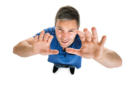 High Angle View Of A Man With Arm Raised On White Backgroundの写真素材