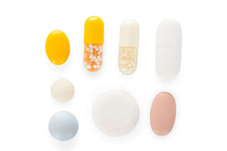 Various Types Of Pills Isolated On White Background