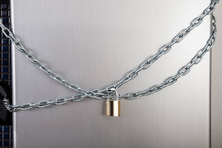 Refrigerator Locked With Metal Chain And Padlockの写真素材