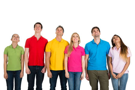 Multiethnic Group Of Friends Looking Up Over White Backgroundの写真素材