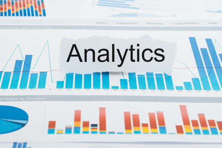 Torn Paper With  Text Analytics On Bar Graph Reportの写真素材