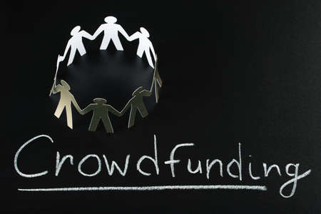 Teamwork Concept With Crowdfunding Word Written On Blackboardの写真素材