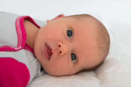 Close-up Of A Cute Little Baby Lying