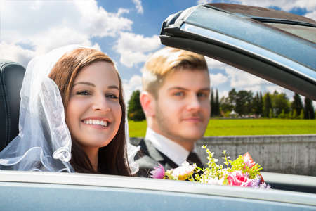 Portrait Of Young Just Married Couple In The Carの写真素材