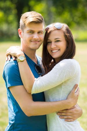 Portrait Of Lovely Couple Hugging Each Other