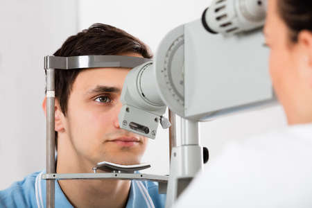 Close-up Of A Young Man Checking Eyesight In Clinic
