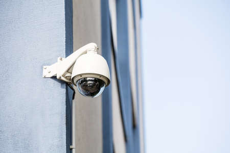 Close-up Of Security Camera Installed On The Wall Of The Building