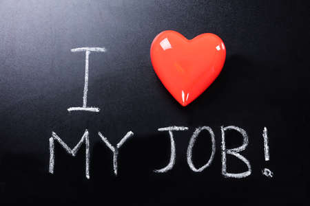 Close-up Of I Love My Job Text Written On Blackboardの写真素材