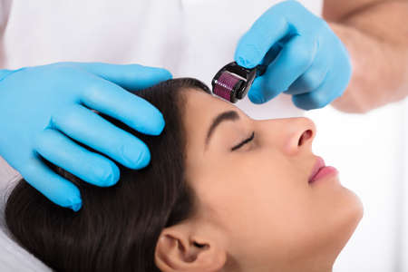 Woman Having Facial Treatment On Her Face In Beauty Salon