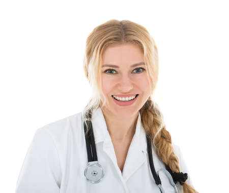 Portrait Of A Happy Young Female Doctor With Stethoscopeの写真素材