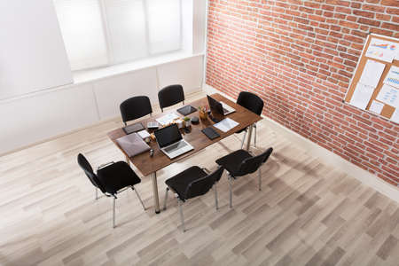 Interior Of Office With Laptop On Workplaceの写真素材