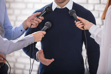 Media Conducting A Press Interview With A Businessmanの写真素材