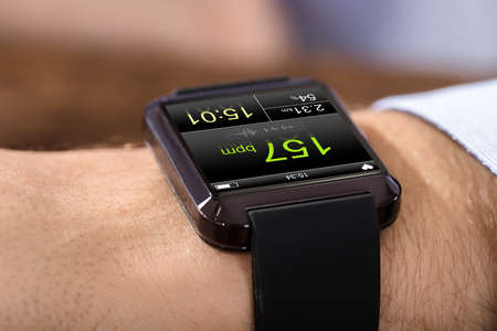 Person Hand Wearing Smart Watch Showing Heartbeat Rate